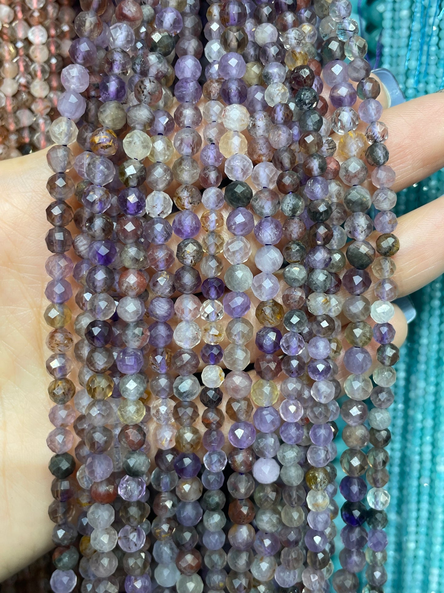 Natural faceted auralite 23 strand 3mm