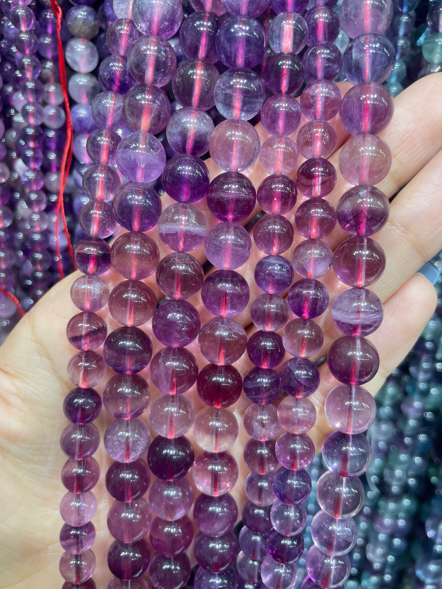 high quality purple fluorite strand