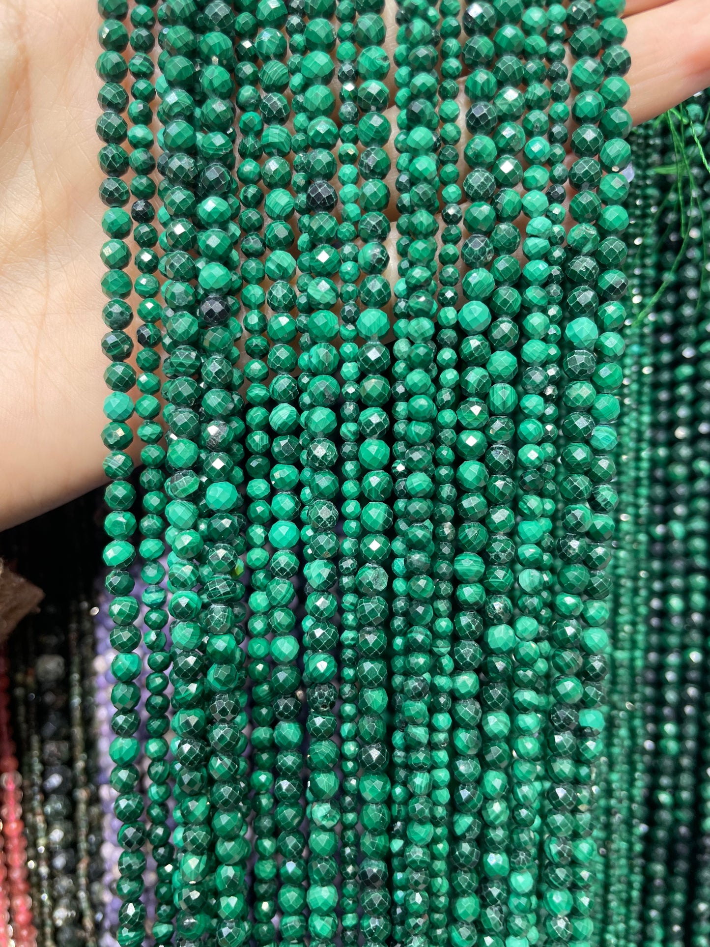 faceted natural malachite strand