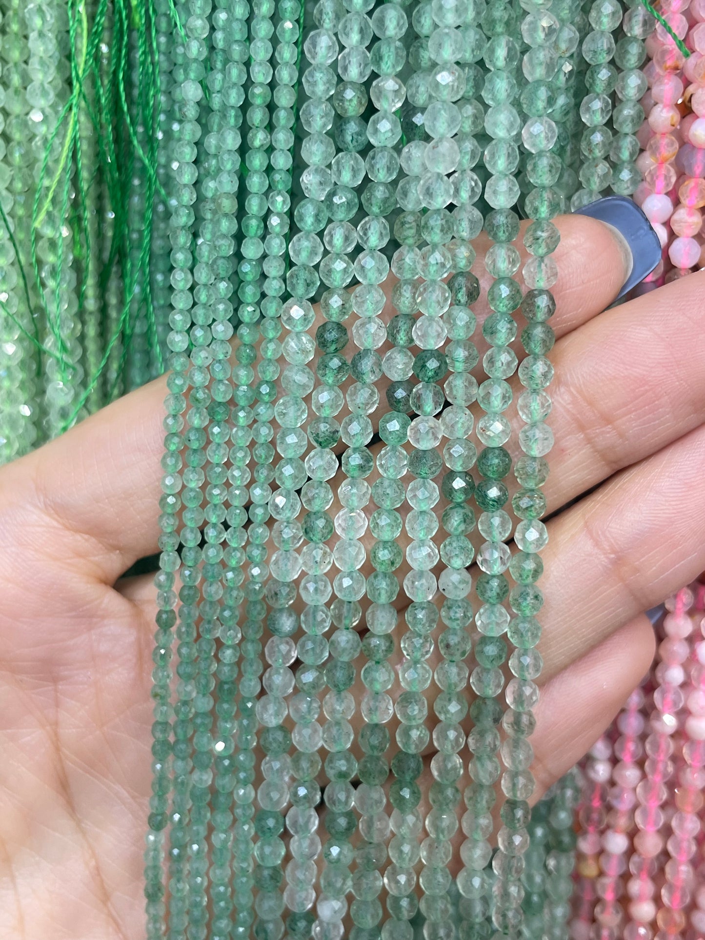 faceted green strawberry strand 2mm
