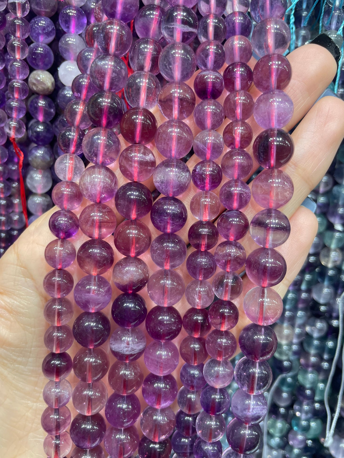 high quality purple fluorite strand