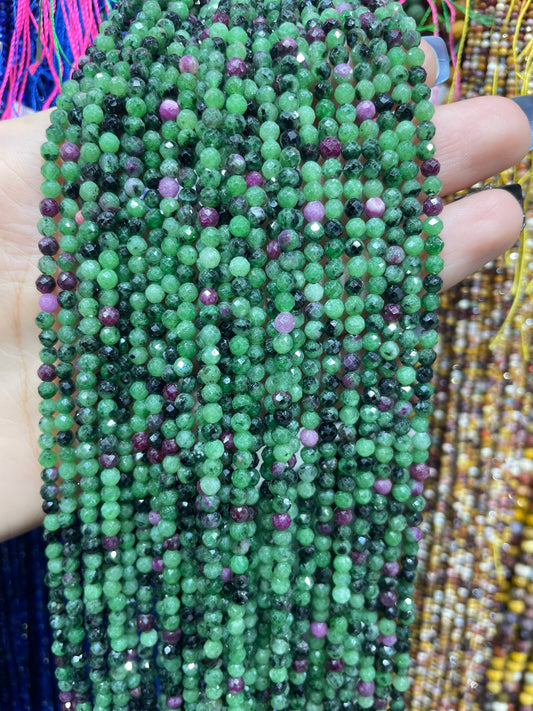 faceted ruby in zoisite strand 3mm