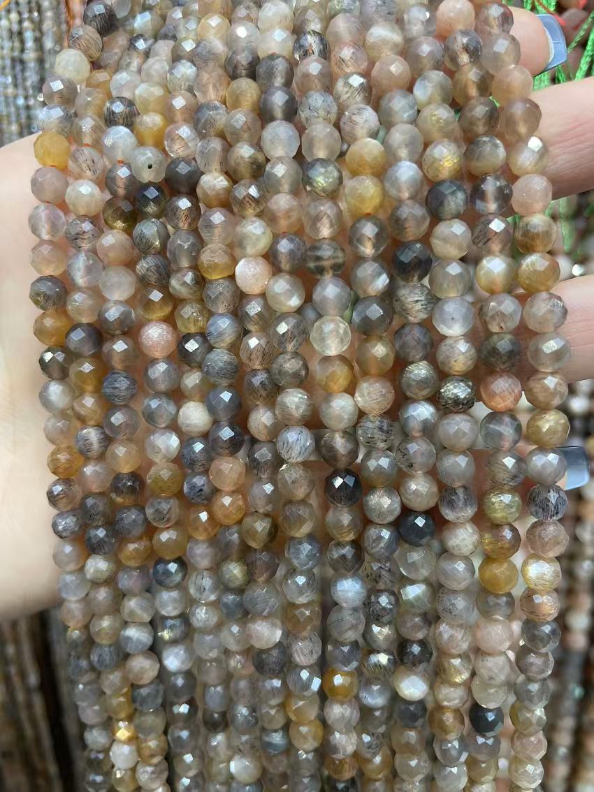 faceted skeleton sunstone strand 5mm