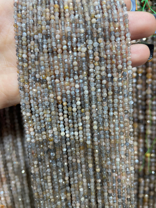 faceted black skeleton sunstone strand 2mm
