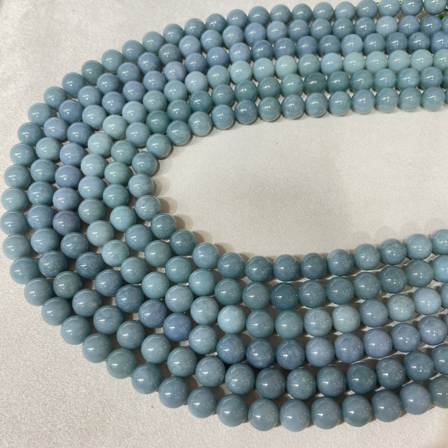 blue water jadelite strands 8.5mm
