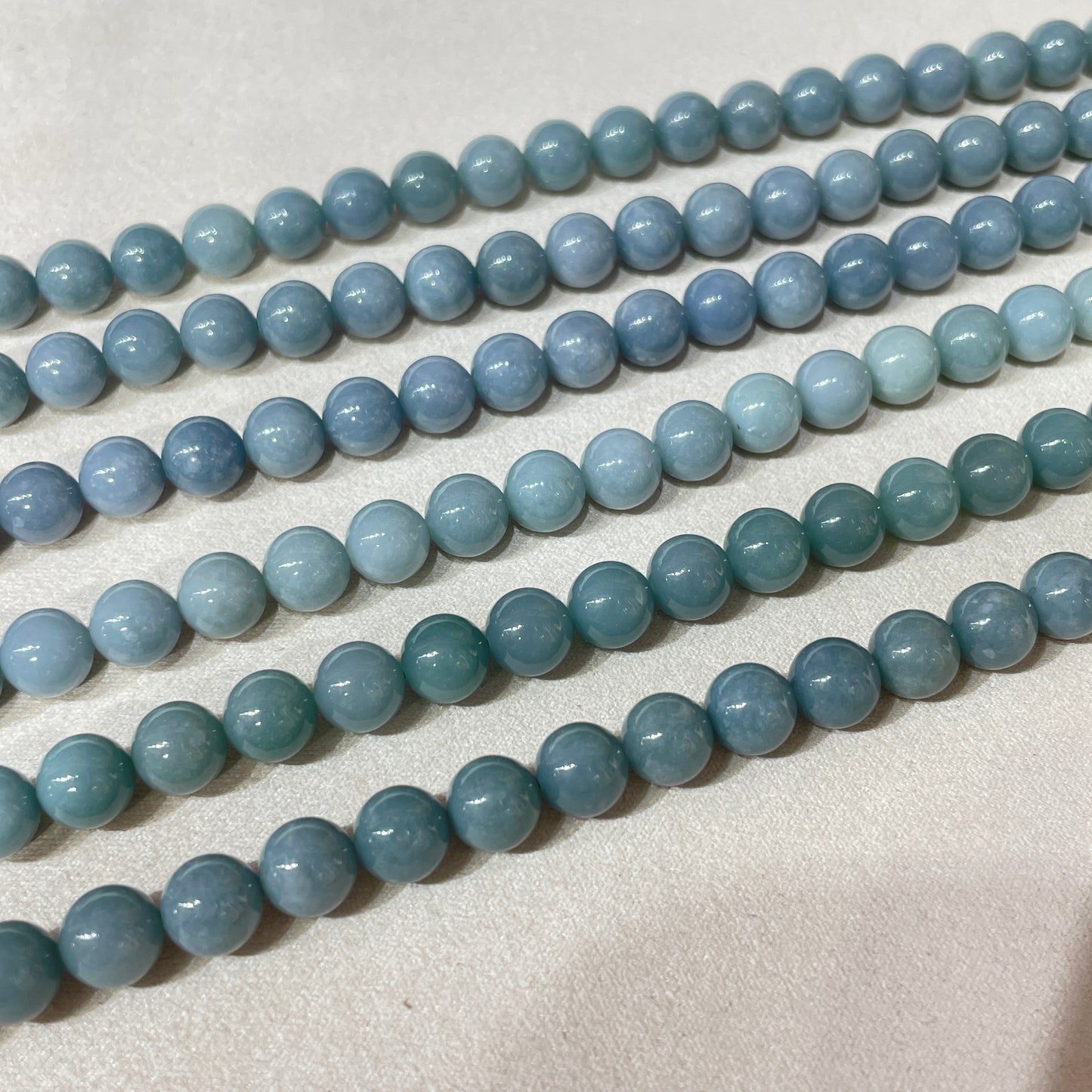 blue water jadelite strands 8.5mm