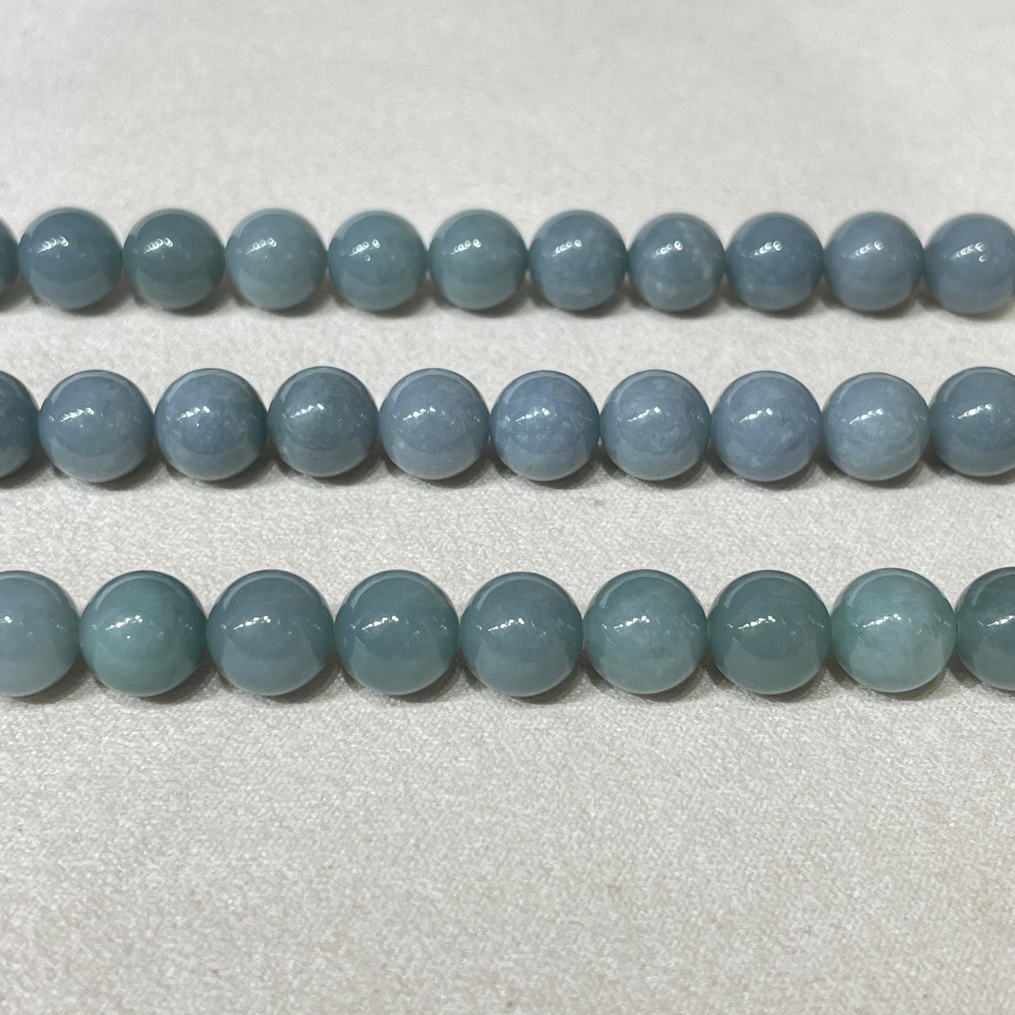 blue water jadelite strands 8.5mm