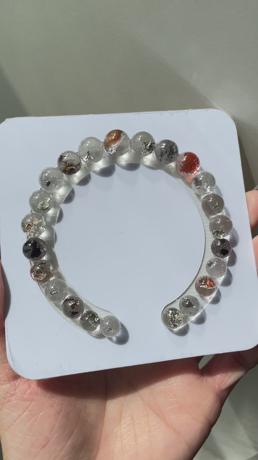 Pyrite in quartz mini spheres